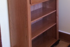 Cherry Bookcase accented by black trim